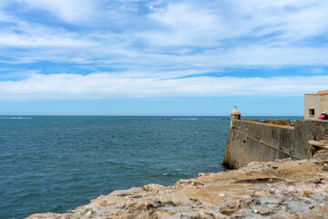 Atlantic ocean view from Castle of Saint Catalina in Cadiz, Spain on April 30, 2023 © Olga Biliak