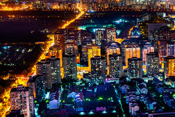 Night scene of bustling buildings in Beijing city streets