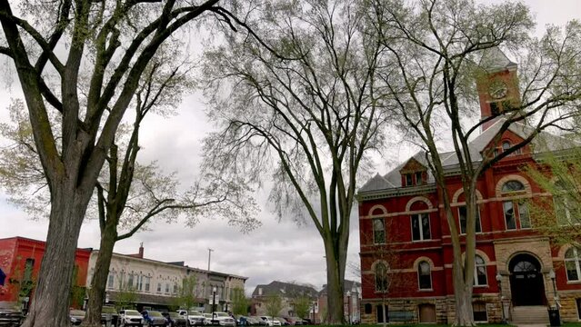 Historic Livingston County Courthouse in Howell, Michigan with gimbal video panning left to right.