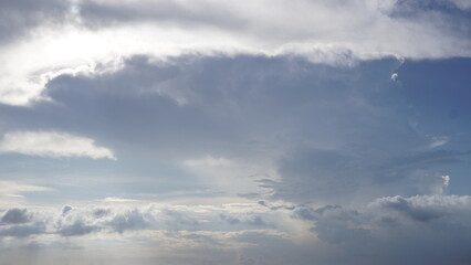 Naklejka na ściany i meble Bright clear blue sky with dense cloud for background, template 
