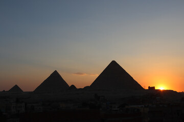 Fototapeta na wymiar Magnificent Giza pyramids during Sunset evening