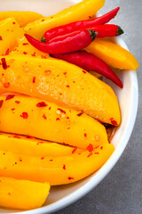 Mango, Chili and honey salad on mottled grey