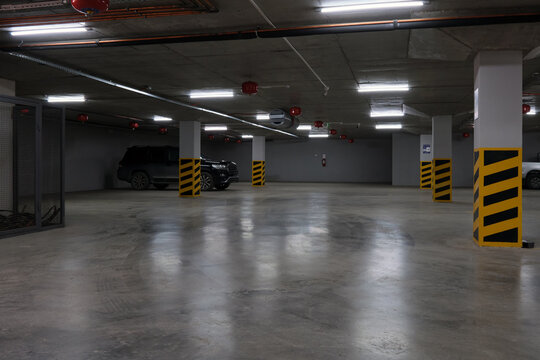 Interior of an empty underground parking for cars,