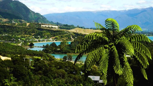 Port Tarakohe NZMCA Park in the background from higher grounds in ligar bay, New Zealand