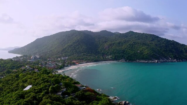 Haad rin beach bay with azure sea on tropical coastline of Thailand.