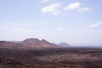 Amazing lunar landscape of Timanfaya National Park on the volcanic island of Lanzarote in Spain.
