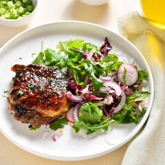 Grilled pork steak with salad from fresh vegetables