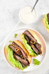 Beef sandwiches with caramelized onion