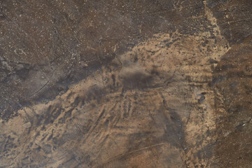 Abstract, mottled textured surface of stone material. Natural rock details with space to copy. Stone background, stone wall background with smooth texture. High quality photo