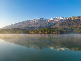 Fototapeta na wymiar magnificent enchanting lake texture, may reflections and wonderful mystical views