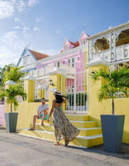 couple men and woman on vacation in Curacao visiting Pietermaai Street Curacao Caribbean