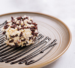 chocolate and vanilla crumb ball on plate