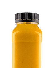 Yellow detox smoothie in bottle on white