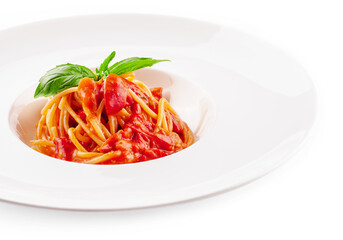 Spaghetti with tomato sauce and cherry tomatoes with basil