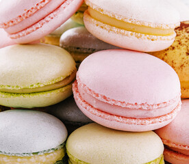 Multicolored macaroons close up background or macro