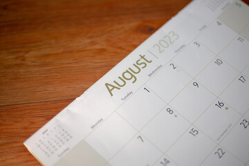 Top view of a closeup calendar of August 2023. Selective focus shot of a calendar on august page. 