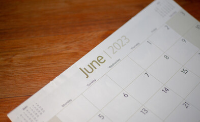 Selective focus shot of a closeup calendar of June 2023. June 2023 calendar isolated on background. 