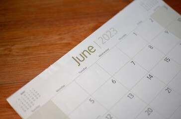 Selective focus shot of a closeup calendar of June 2023. June 2023 calendar isolated on background. 