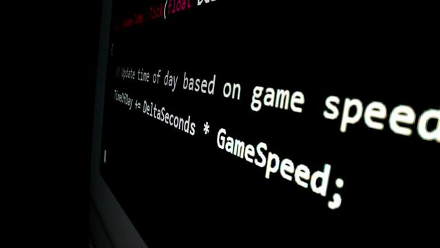 Closeup macro shot movement of coding script moving across LED screen with real-time AI-generated typing, showcasing advanced AI learning in optimization, debug and coding for software development.