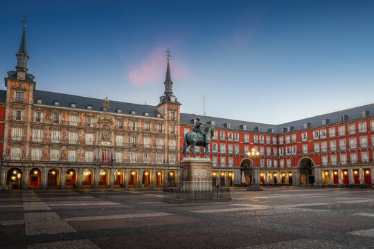Plaza Mayor at sunrise with King Philip III (Felipe III) statue - Madrid, Spain