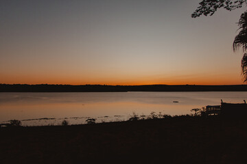 sun setting on the coastline