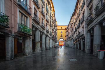 Calle de Toledo Street with Arches leading to Plaza Mayor - Madrid, Spain