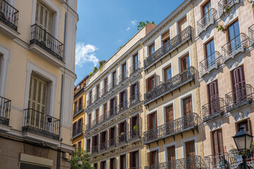 Fototapeta na wymiar Traditional Spanish architecture - Building Facades with balconies - Madrid, Spain