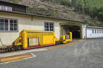 Miners’ transportation railway entering a mine gallery, Rammelsberg mine site, Goslar, Harz, Lower-Saxony, Germany