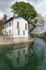 Fototapeta na wymiar Historic house along Martesana canal, Milan, Italy