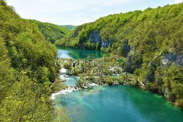 Obraz premium View of cascade waterfall at Milanovac lake at Plitvice lakes national park in in Lika-Senj county, Croatia