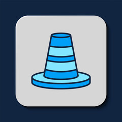 Filled outline Traffic cone icon isolated on blue background. Vector