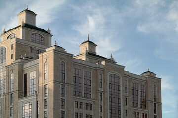Fototapeta premium Facade and roof of a residential complex in the city of Almaty, Kazakhstan.