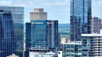 Fototapeta na wymiar Nashville, Tennessee skyline with glass office tower architecture downtown in Country music capital