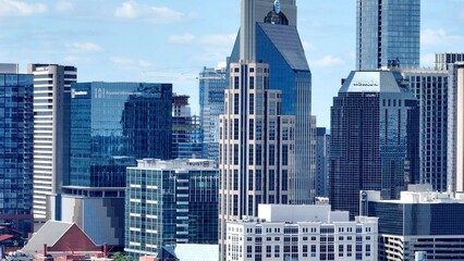 Nashville, Tennessee skyline with glass office tower architecture downtown in Country music capital