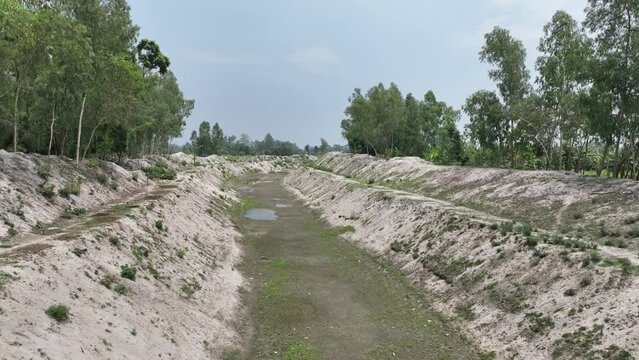 Dry River in Drought Conditions due to global warming and climate change. Aerial Drone View of Dry river bed. mora bangali river, sariakandi, bogura, rajshahi, bangladesh