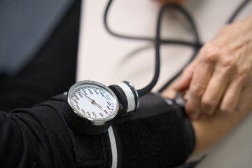 Person is measured blood pressure with a special apparatus
