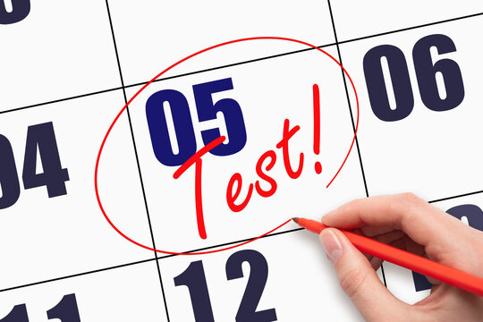 5th day of the month. Hand writing text TEST and circling the calendar date.
