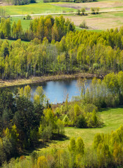 Spring landscape by lake Lubonenš Latvia, in the countryside of Latgale.