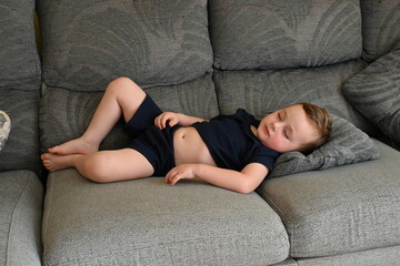 Fototapeta premium person sleeping on sofa