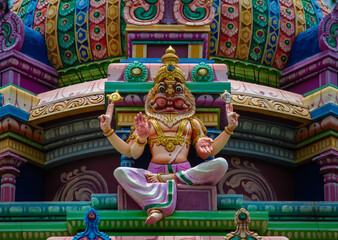 Temple tower with Hindu god lord Vishnu in Narasimha avatar (lion face)
