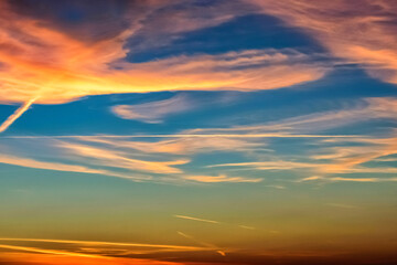 Real amazing panoramic sunrise or sunset sky with gentle colorful clouds.Skyline top view Evening sunset sky and the morning sunrise.Nature Backgrounds