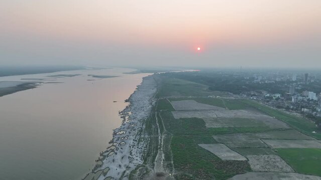 sunset over the river, Beautiful romantic sunset landscape drone view High quality video footage, padma river, rajshahi, bangladesh