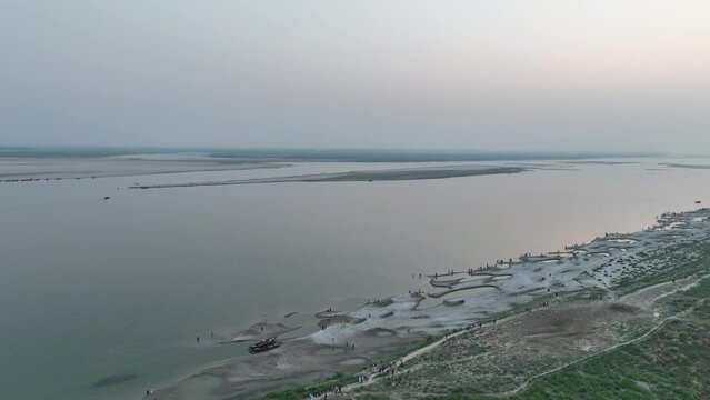 view from the padma river beach at sunset time aerial view, High quality aerial smooth video footage, padma river, rajshahi, bangladesh