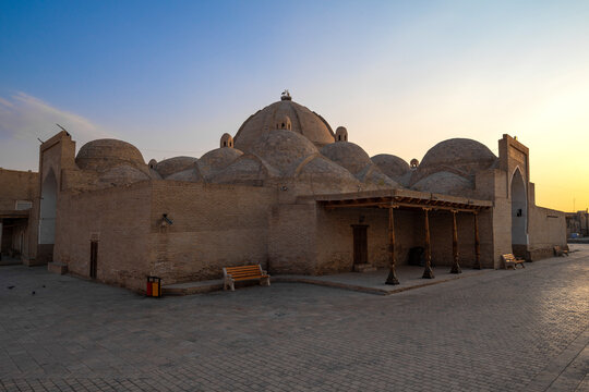 View of the medieval shopping complex Toqi Zargaron at sunrise. Bukhara, Uzbekistan