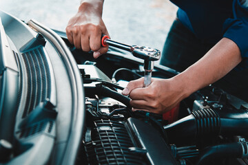 Mechanic open vehicle hood checking up auto mobile, fixing a car at home,Repair and service