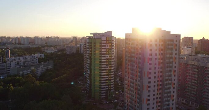 New high-rise residential houses in Moscow at sunset in summer. Drone view