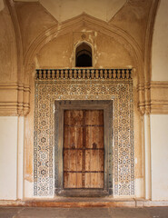 Doorway to historic tomb building in Qutb Shahi Archaeological Park, Hyderabad, India