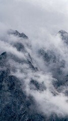 Clouds over mountain ridge