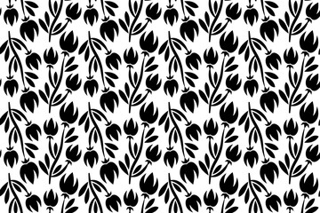 Abstract floral seamless pattern. Black and white stylized, decorative design. Endless repeating monochrome pattern with flat floral design elements.