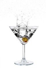Olive splash into cocktail isolated on white